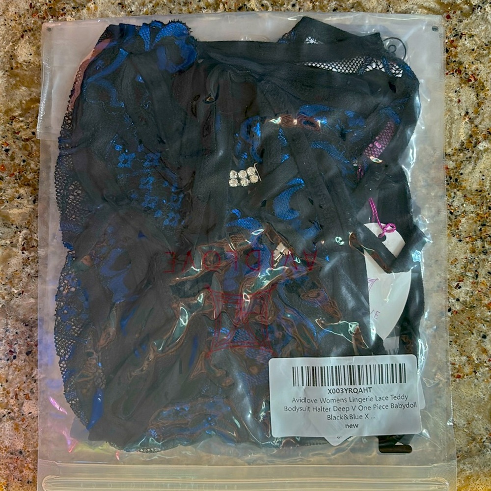 Brand new never opened Lace Teddy Bodysuit